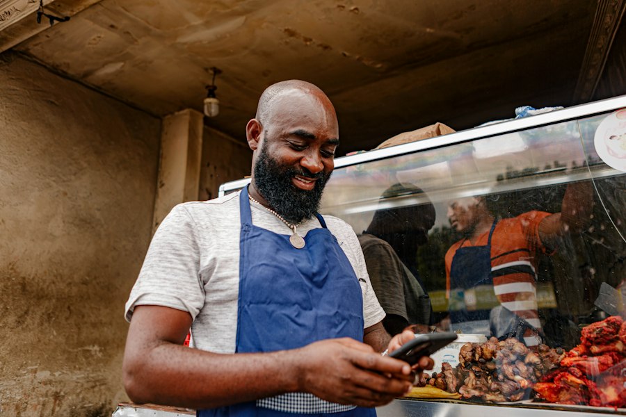 Local business owner helping a customer